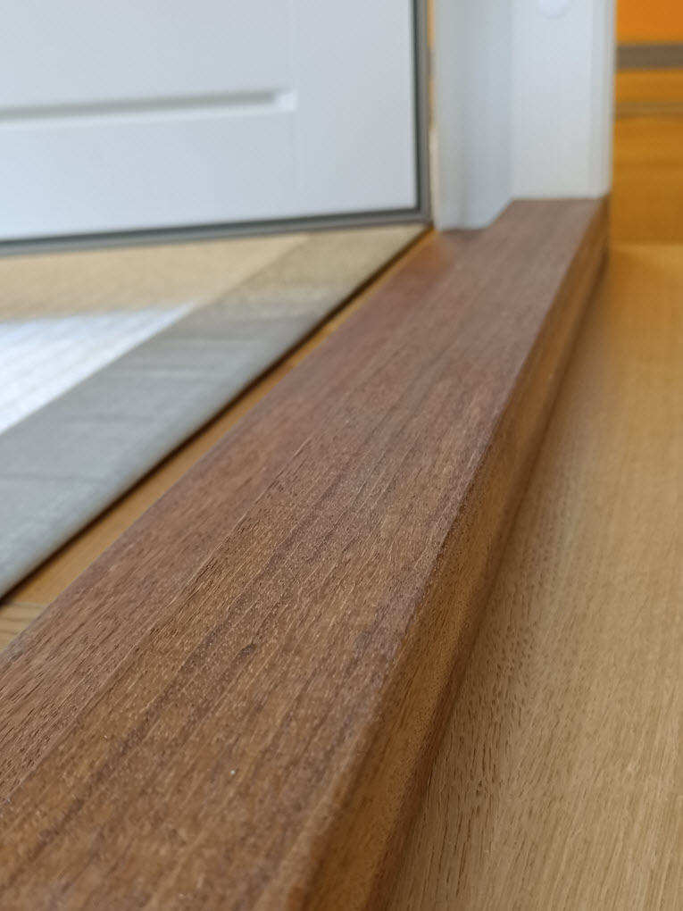 Tröskel i äldelträ